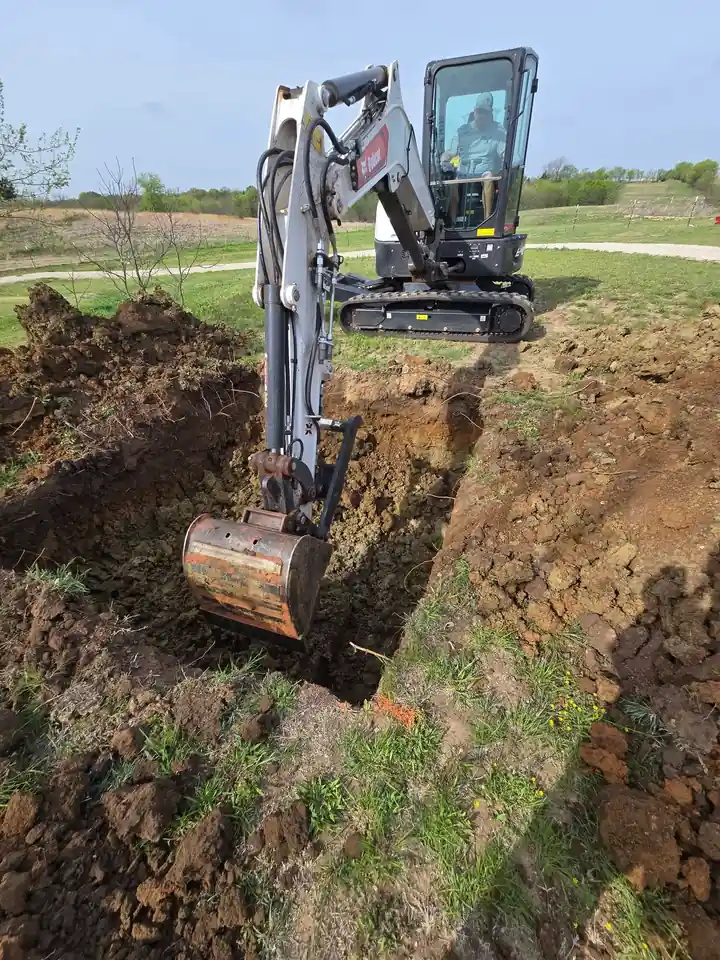 HJH crew performing precision grading work