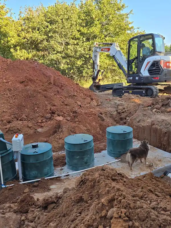 Septic system installation in progress on rural property